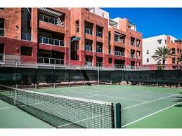Tennis court near building
